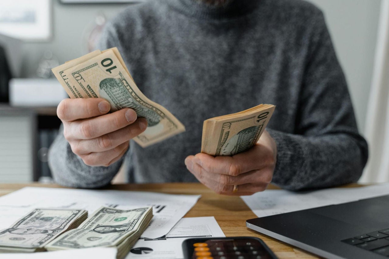Person counting money