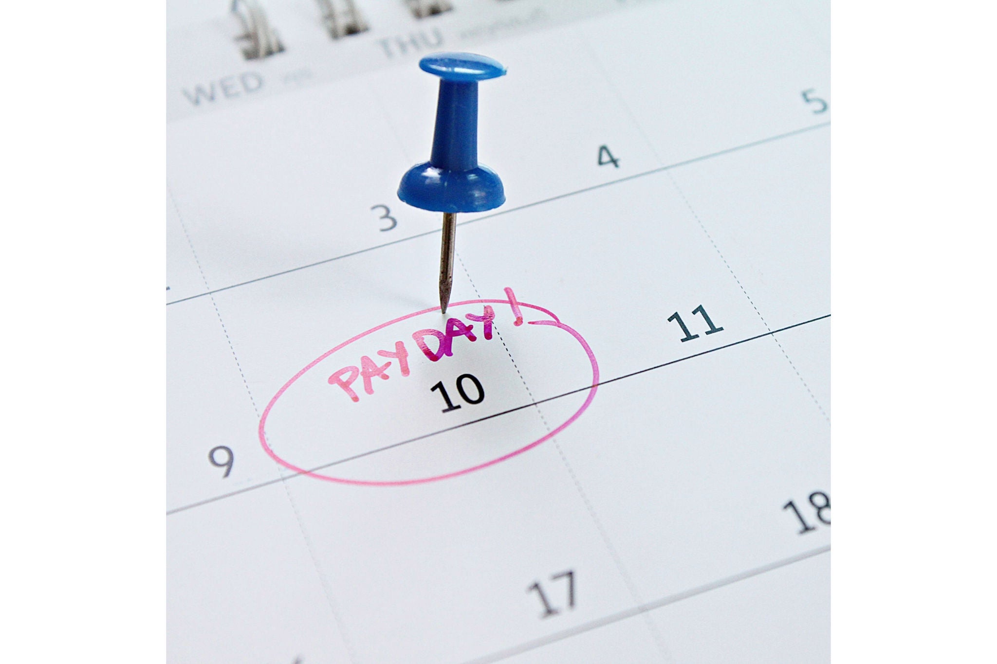 Business, finance, savings money, wages, payroll or accounting concept : Calendar with Blue thumbtack in word payday for remind