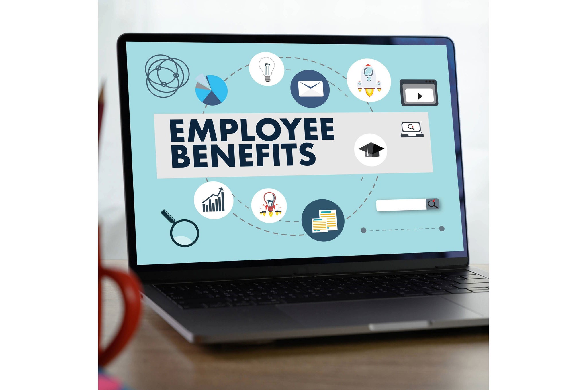 EMPLOYEE BENEFITS Man working on tablet TECHNOLOGY COMMUNICATION